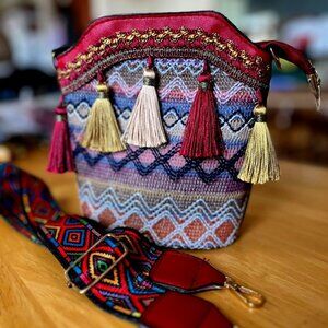 Mini Boho Crossbody Bag has red PU back and woven front with tassels